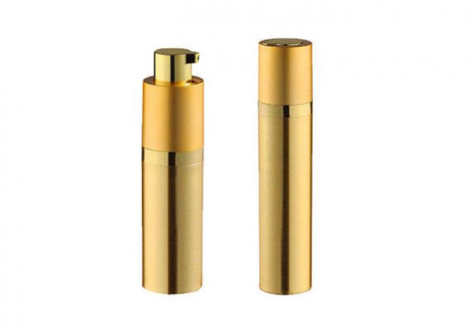Gouden cilindrische kosmetische vacuümpompfles